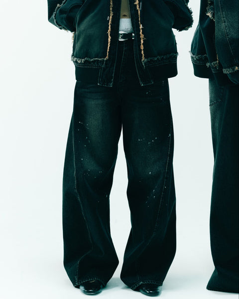 AGING TWISTED DENIM PANTS