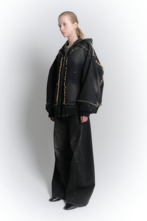 AGING TWISTED DENIM PANTS