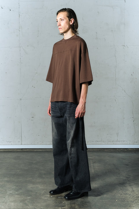 AGING TWISTED DENIM PANTS