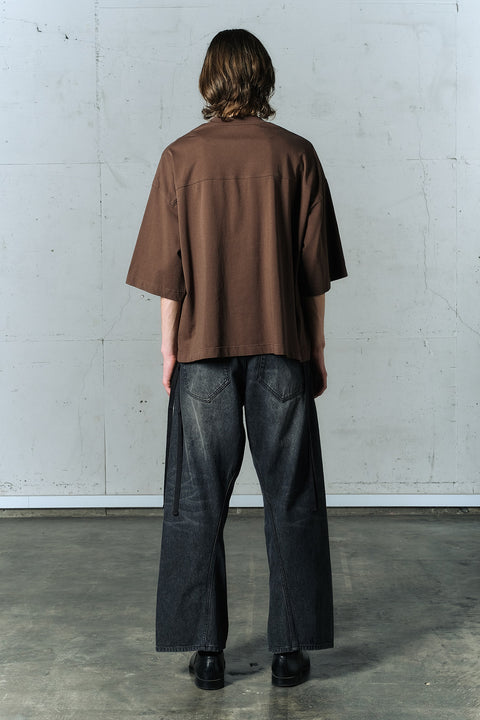 AGING TWISTED DENIM PANTS