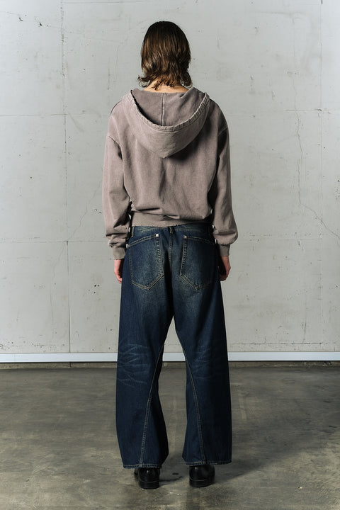 AGING TWISTED DENIM PANTS