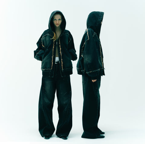 AGING TWISTED DENIM PANTS