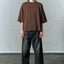 AGING TWISTED DENIM PANTS