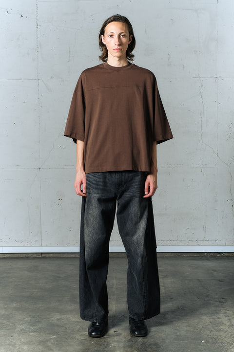 AGING TWISTED DENIM PANTS