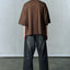 AGING TWISTED DENIM PANTS