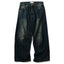AGING TWISTED DENIM PANTS