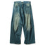 AGING TWISTED DENIM PANTS