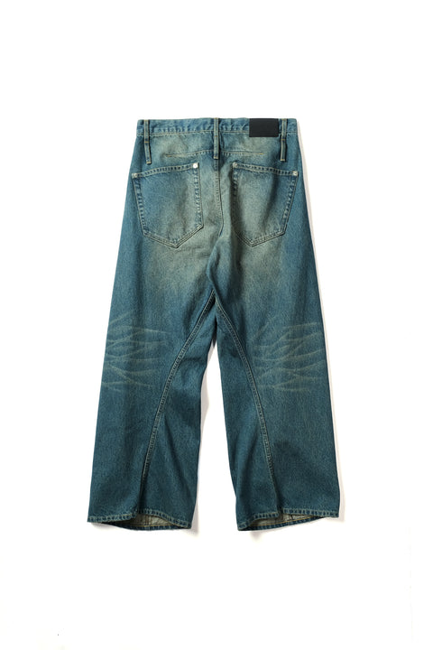 AGING TWISTED DENIM PANTS