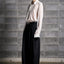 FOLDED WOOL TROUSERS